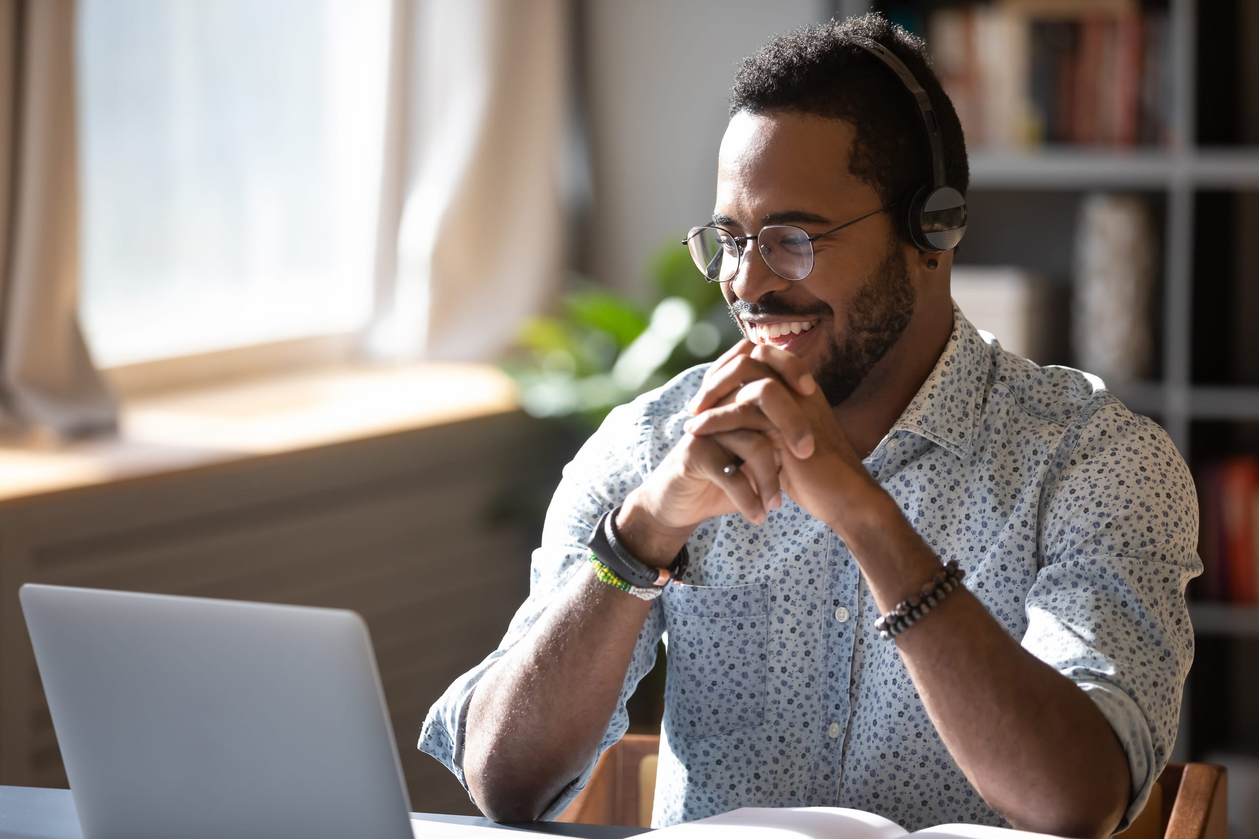 Healthcare professional learning online with a headset